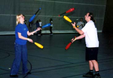 Simon tries to make Tammy into a decent juggler.